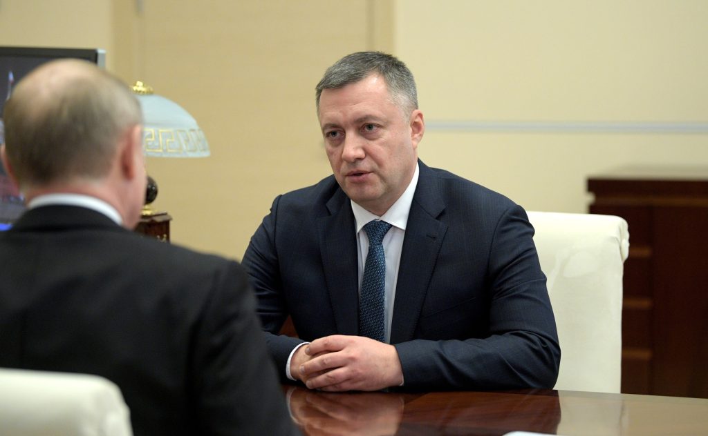 Irkutsk’s Governor Igor Kobzev meeting with Russian President Vladimir Putin in 2019, in a photograph released by the Kremlin’s press service.